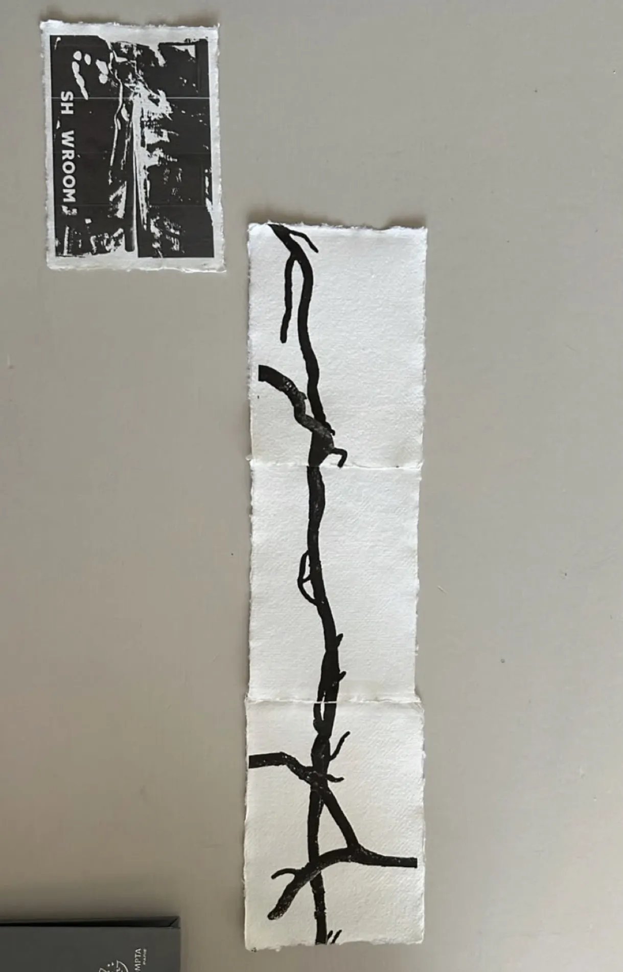 Vertical branch and root print on handmade deckle-edge paper